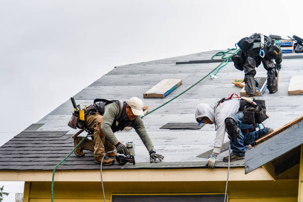 Professional Gutter Installation technician working in Fulton, NY